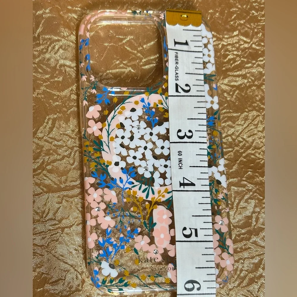 Kate Spade iPhone clear clover with flowers and a little bling